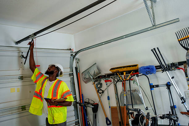 Professional Garage Door Panel Replacement technician working in Ossian, IN